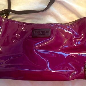 Small should bag by Kate Spade in purple vinyl with brown strap